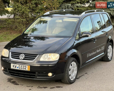 Черный Фольксваген Туран, объемом двигателя 1.6 л и пробегом 192 тыс. км за 4900 $, фото 7 на Automoto.ua