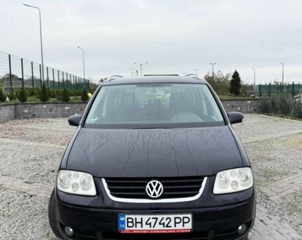 Черный Фольксваген Туран, объемом двигателя 1.6 л и пробегом 264 тыс. км за 5000 $, фото 1 на Automoto.ua