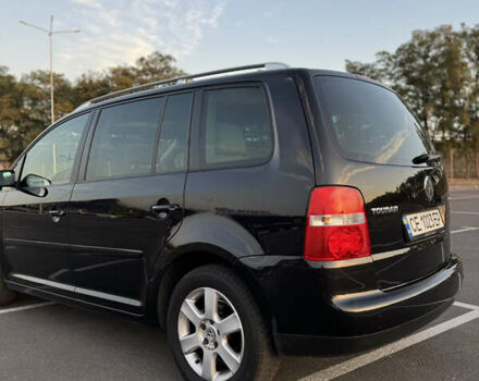 Черный Фольксваген Туран, объемом двигателя 1.6 л и пробегом 253 тыс. км за 5500 $, фото 14 на Automoto.ua