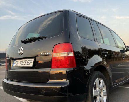 Черный Фольксваген Туран, объемом двигателя 1.6 л и пробегом 253 тыс. км за 5500 $, фото 11 на Automoto.ua