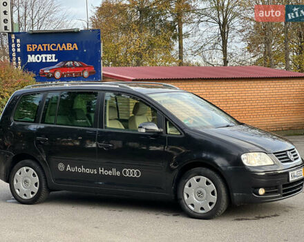 Черный Фольксваген Туран, объемом двигателя 1.6 л и пробегом 192 тыс. км за 4900 $, фото 3 на Automoto.ua