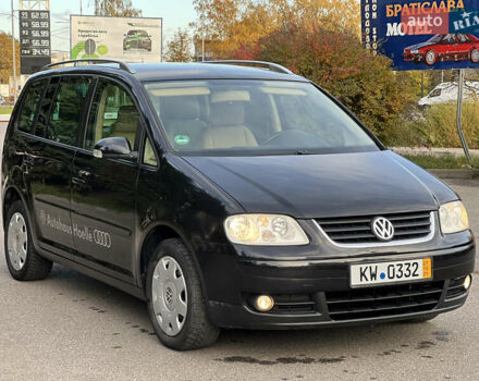 Черный Фольксваген Туран, объемом двигателя 1.6 л и пробегом 192 тыс. км за 4900 $, фото 2 на Automoto.ua