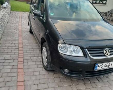 Черный Фольксваген Туран, объемом двигателя 1.6 л и пробегом 167 тыс. км за 6000 $, фото 2 на Automoto.ua