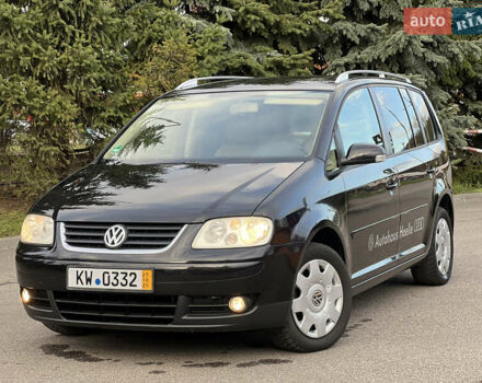 Черный Фольксваген Туран, объемом двигателя 1.6 л и пробегом 192 тыс. км за 4900 $, фото 25 на Automoto.ua