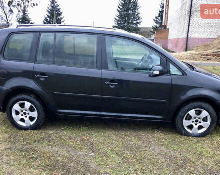 Черный Фольксваген Туран, объемом двигателя 1.97 л и пробегом 400 тыс. км за 4999 $, фото 3 на Automoto.ua