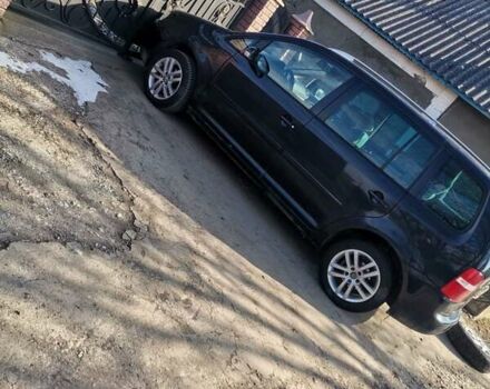 Черный Фольксваген Туран, объемом двигателя 1.6 л и пробегом 218 тыс. км за 5600 $, фото 1 на Automoto.ua