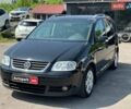 Черный Фольксваген Туран, объемом двигателя 1.6 л и пробегом 275 тыс. км за 5390 $, фото 1 на Automoto.ua