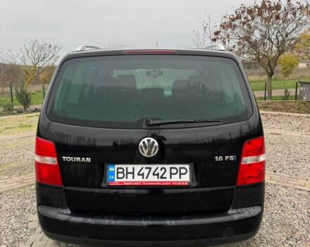 Черный Фольксваген Туран, объемом двигателя 1.6 л и пробегом 264 тыс. км за 5000 $, фото 2 на Automoto.ua