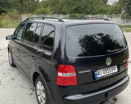 Черный Фольксваген Туран, объемом двигателя 1.6 л и пробегом 235 тыс. км за 6500 $, фото 6 на Automoto.ua