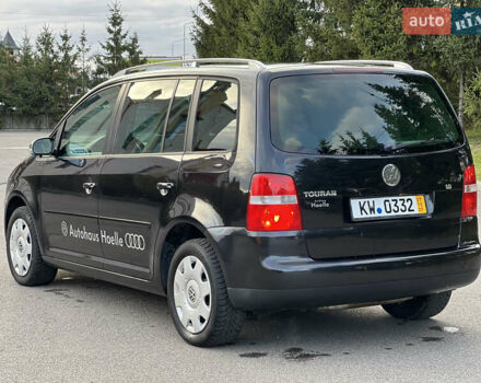 Черный Фольксваген Туран, объемом двигателя 1.6 л и пробегом 192 тыс. км за 4900 $, фото 6 на Automoto.ua