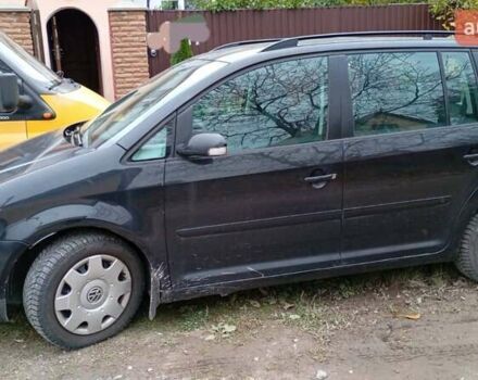 Черный Фольксваген Туран, объемом двигателя 1.6 л и пробегом 314 тыс. км за 5500 $, фото 1 на Automoto.ua