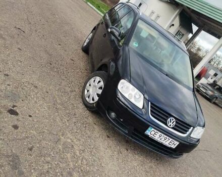 Черный Фольксваген Туран, объемом двигателя 1.6 л и пробегом 218 тыс. км за 5600 $, фото 7 на Automoto.ua