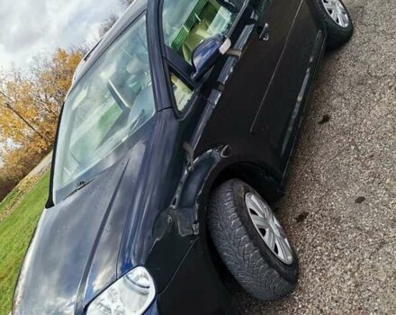 Черный Фольксваген Туран, объемом двигателя 1.6 л и пробегом 218 тыс. км за 5600 $, фото 6 на Automoto.ua