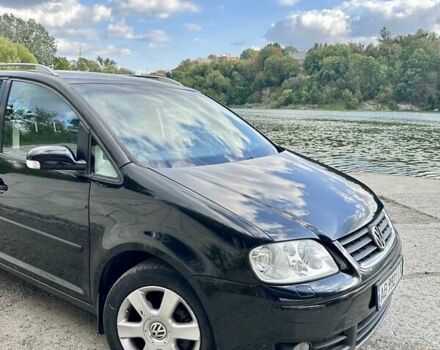 Черный Фольксваген Туран, объемом двигателя 1.6 л и пробегом 276 тыс. км за 5300 $, фото 7 на Automoto.ua