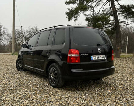 Черный Фольксваген Туран, объемом двигателя 1.6 л и пробегом 208 тыс. км за 5700 $, фото 16 на Automoto.ua