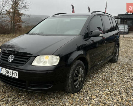 Черный Фольксваген Туран, объемом двигателя 1.6 л и пробегом 208 тыс. км за 5700 $, фото 33 на Automoto.ua