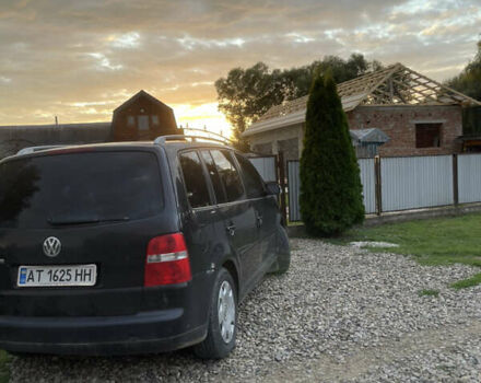 Черный Фольксваген Туран, объемом двигателя 1.6 л и пробегом 218 тыс. км за 5900 $, фото 7 на Automoto.ua