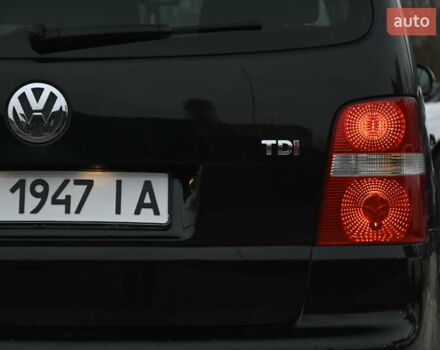 Чорний Фольксваген Туран, об'ємом двигуна 2 л та пробігом 267 тис. км за 5999 $, фото 11 на Automoto.ua