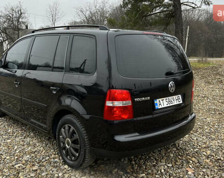 Черный Фольксваген Туран, объемом двигателя 1.6 л и пробегом 208 тыс. км за 5700 $, фото 36 на Automoto.ua