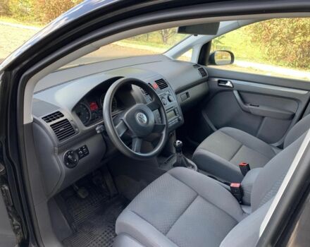 Чорний Фольксваген Туран, об'ємом двигуна 0 л та пробігом 244 тис. км за 6450 $, фото 1 на Automoto.ua