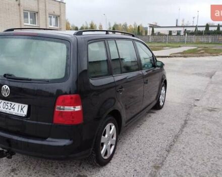Чорний Фольксваген Туран, об'ємом двигуна 1.6 л та пробігом 249 тис. км за 5500 $, фото 2 на Automoto.ua