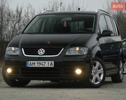 Чорний Фольксваген Туран, об'ємом двигуна 2 л та пробігом 267 тис. км за 5999 $, фото 6 на Automoto.ua