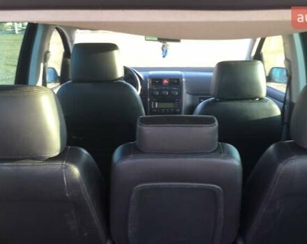 Черный Фольксваген Туран, объемом двигателя 1.97 л и пробегом 347 тыс. км за 5300 $, фото 2 на Automoto.ua