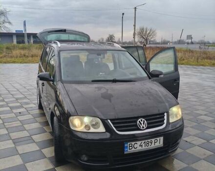 Чорний Фольксваген Туран, об'ємом двигуна 1.97 л та пробігом 262 тис. км за 6500 $, фото 4 на Automoto.ua