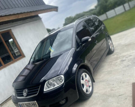 Черный Фольксваген Туран, объемом двигателя 1.6 л и пробегом 218 тыс. км за 5900 $, фото 2 на Automoto.ua