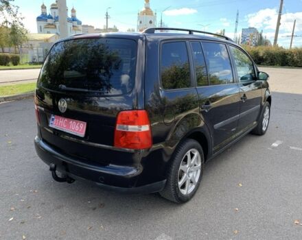 Чорний Фольксваген Туран, об'ємом двигуна 0 л та пробігом 244 тис. км за 6450 $, фото 5 на Automoto.ua