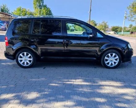 Чорний Фольксваген Туран, об'ємом двигуна 1.6 л та пробігом 190 тис. км за 5500 $, фото 1 на Automoto.ua