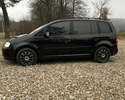 Черный Фольксваген Туран, объемом двигателя 1.6 л и пробегом 208 тыс. км за 5700 $, фото 18 на Automoto.ua
