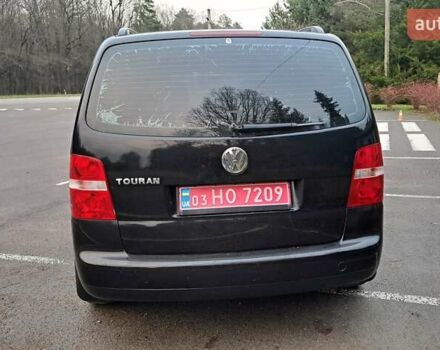 Черный Фольксваген Туран, объемом двигателя 1.6 л и пробегом 240 тыс. км за 5700 $, фото 3 на Automoto.ua