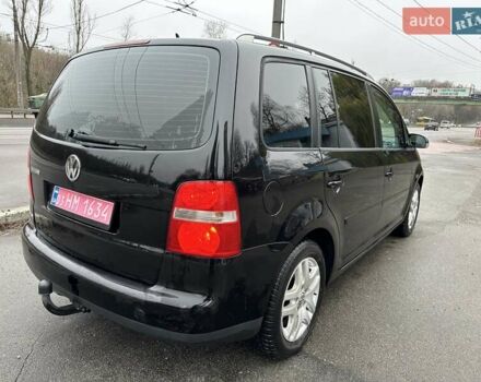 Черный Фольксваген Туран, объемом двигателя 1.6 л и пробегом 192 тыс. км за 5700 $, фото 5 на Automoto.ua