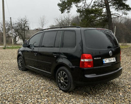 Черный Фольксваген Туран, объемом двигателя 1.6 л и пробегом 208 тыс. км за 5700 $, фото 19 на Automoto.ua