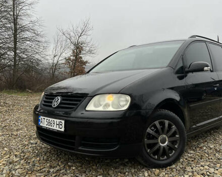 Черный Фольксваген Туран, объемом двигателя 1.6 л и пробегом 208 тыс. км за 5700 $, фото 7 на Automoto.ua