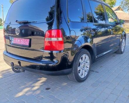 Чорний Фольксваген Туран, об'ємом двигуна 1.6 л та пробігом 190 тис. км за 5500 $, фото 5 на Automoto.ua