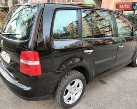 Черный Фольксваген Туран, объемом двигателя 1.6 л и пробегом 202 тыс. км за 5300 $, фото 3 на Automoto.ua