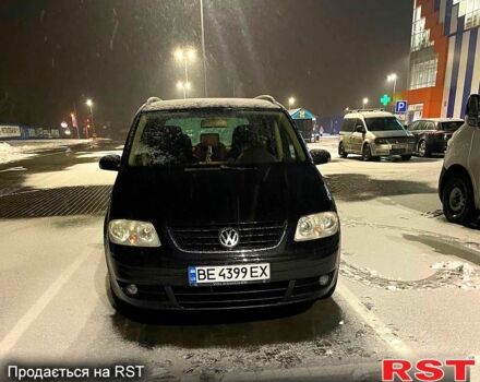 Черный Фольксваген Туран, объемом двигателя 2 л и пробегом 265 тыс. км за 5800 $, фото 6 на Automoto.ua