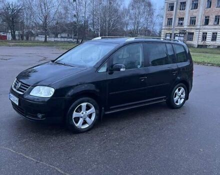 Черный Фольксваген Туран, объемом двигателя 1.97 л и пробегом 293 тыс. км за 5900 $, фото 4 на Automoto.ua