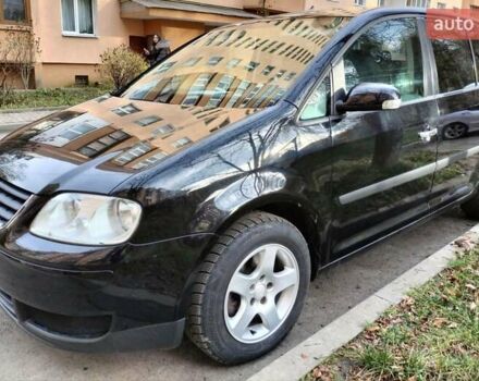 Черный Фольксваген Туран, объемом двигателя 1.6 л и пробегом 202 тыс. км за 5300 $, фото 5 на Automoto.ua