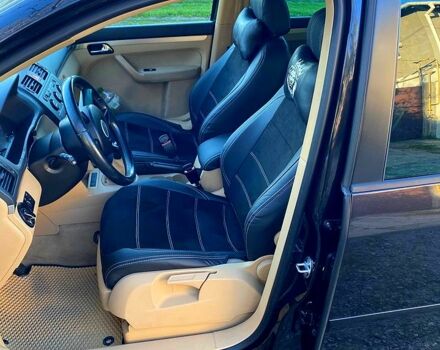 Черный Фольксваген Туран, объемом двигателя 2 л и пробегом 265 тыс. км за 5800 $, фото 4 на Automoto.ua