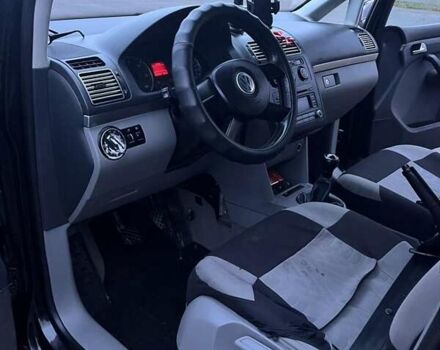 Черный Фольксваген Туран, объемом двигателя 1.97 л и пробегом 293 тыс. км за 5900 $, фото 10 на Automoto.ua