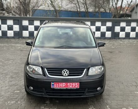 Черный Фольксваген Туран, объемом двигателя 1.6 л и пробегом 206 тыс. км за 5350 $, фото 1 на Automoto.ua