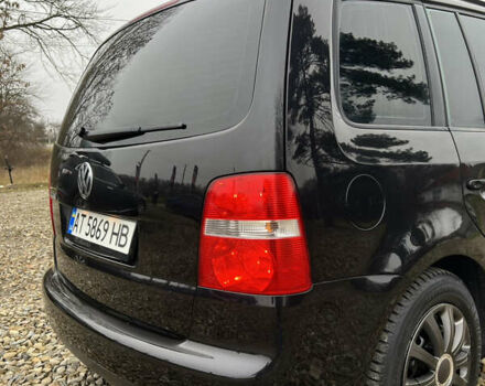 Черный Фольксваген Туран, объемом двигателя 1.6 л и пробегом 208 тыс. км за 5700 $, фото 14 на Automoto.ua