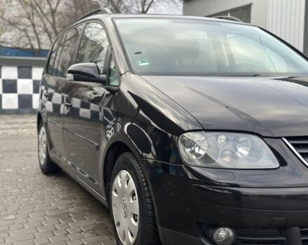 Черный Фольксваген Туран, объемом двигателя 1.6 л и пробегом 206 тыс. км за 5350 $, фото 3 на Automoto.ua