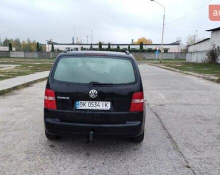 Чорний Фольксваген Туран, об'ємом двигуна 1.6 л та пробігом 249 тис. км за 5500 $, фото 5 на Automoto.ua