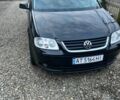 Черный Фольксваген Туран, объемом двигателя 1.9 л и пробегом 240 тыс. км за 7200 $, фото 1 на Automoto.ua