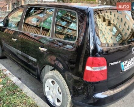 Черный Фольксваген Туран, объемом двигателя 1.6 л и пробегом 202 тыс. км за 5300 $, фото 4 на Automoto.ua