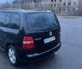 Черный Фольксваген Туран, объемом двигателя 1.97 л и пробегом 293 тыс. км за 5900 $, фото 1 на Automoto.ua
